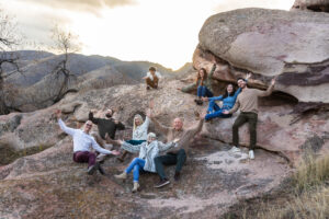 Littleton family photographer Colorado foothills mother father son kid child photography sunset Ken Caryl Valley grandmother aunts uncles red rocks