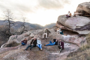 Littleton family photographer Colorado foothills mother father son kid child photography sunset Ken Caryl Valley grandmother aunts uncles red rocks