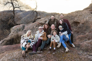 Littleton family photographer Colorado foothills mother father son kid child photography sunset Ken Caryl Valley grandmother aunts uncles red rocks