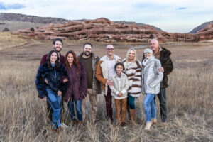 Littleton family photographer Colorado foothills mother father son kid child photography sunset Ken Caryl Valley grandmother aunts uncles red rocks