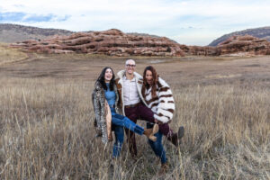 Littleton family photographer Colorado foothills mother father son kid child photography sunset Ken Caryl Valley grandmother aunts uncles red rocks