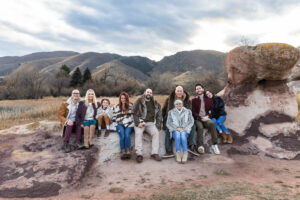 Littleton family photographer Colorado foothills mother father son kid child photography sunset Ken Caryl Valley grandmother aunts uncles red rocks