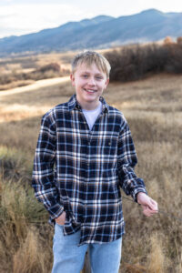 Littleton family photographer South Valley park Colorado red rocks mother father brother sister sibling kids photography foothills sunset fall