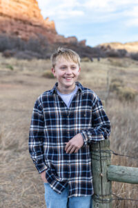 Littleton family photographer South Valley park Colorado red rocks mother father brother sister sibling kids photography foothills sunset fall