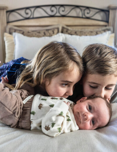 Littleton family and baby photographer newborn son little brother Colorado lifestyle in home photography big sister