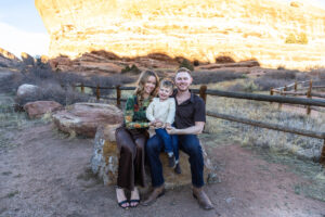 Littleton family photographer Red Rocks winter Colorado sister mother father brother son photography sunset grandson grandmother