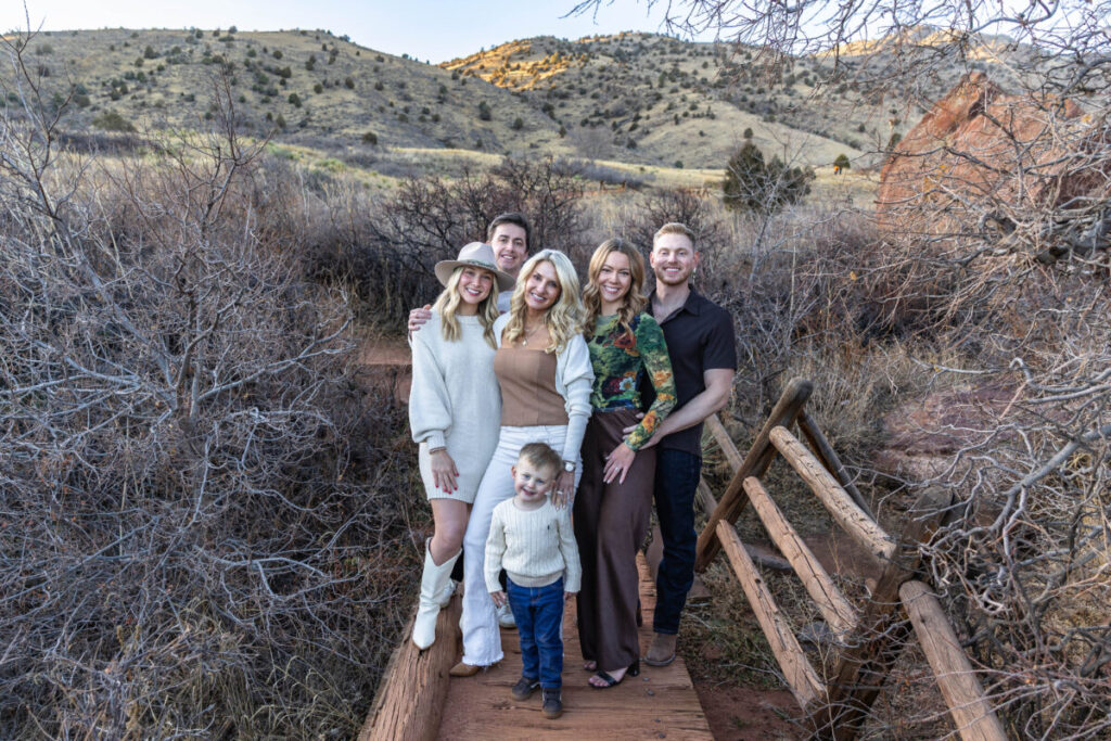 Littleton family photographer Red Rocks winter Colorado sister mother father brother son photography sunset grandson grandmother