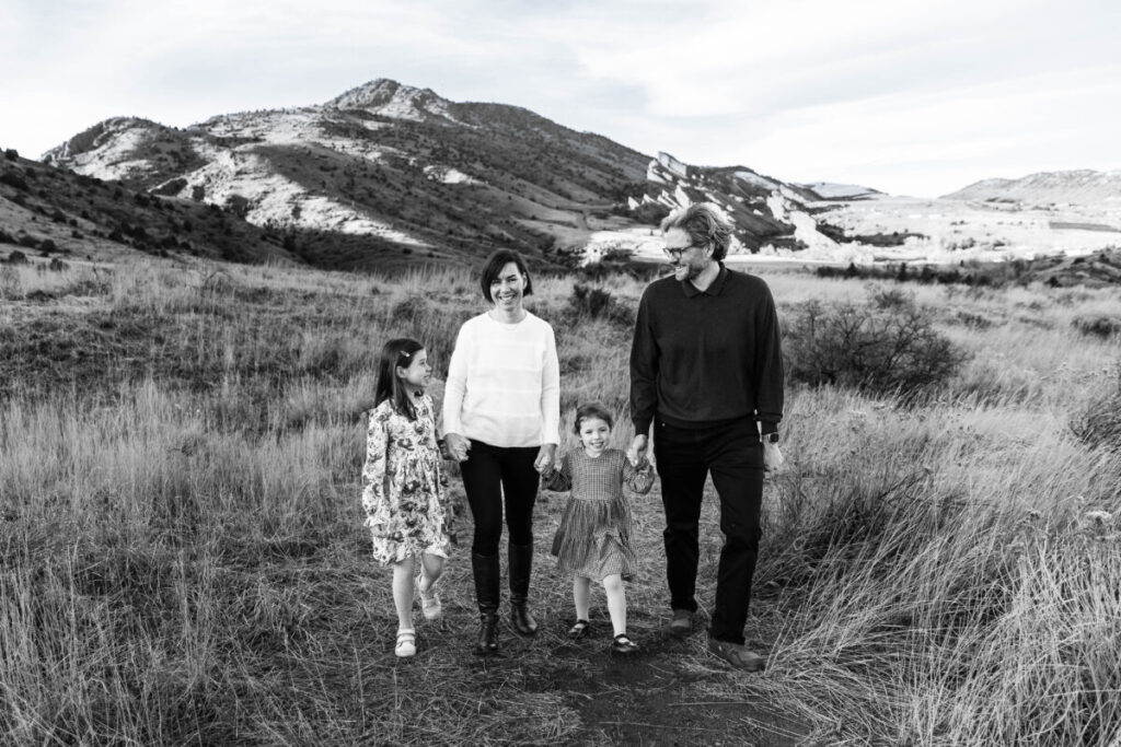 Littleton family walking near Red Rocks in Colorado.  A family photo session in the winter in Morrison.