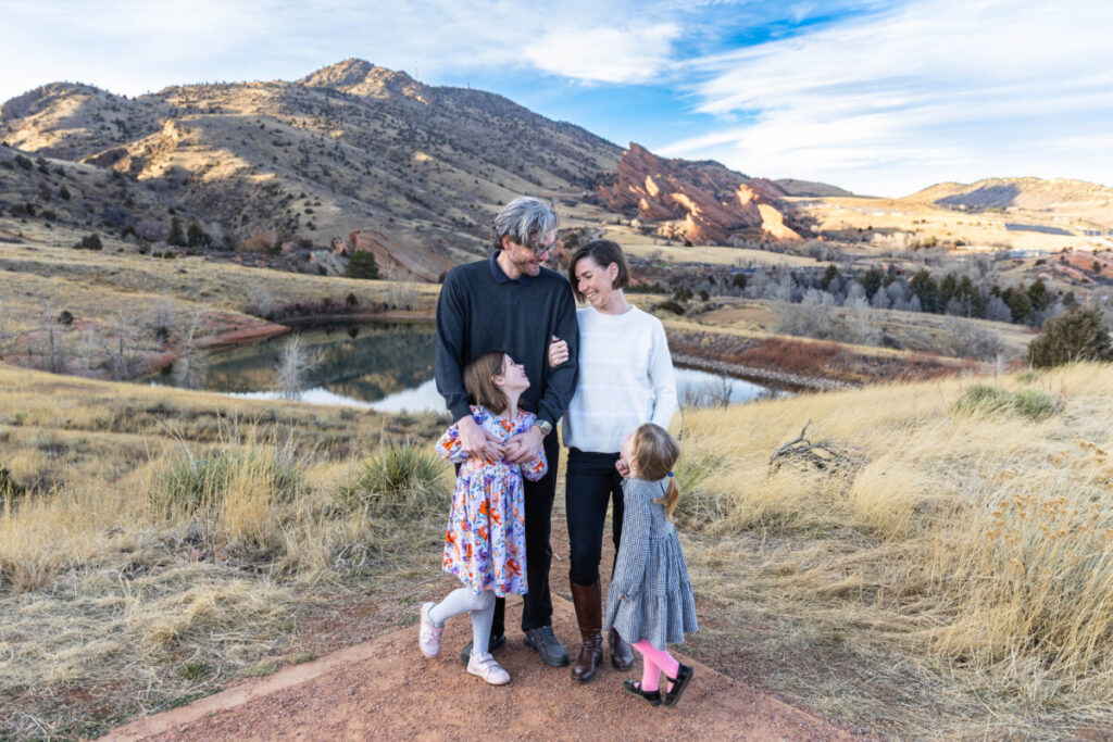 Littleton family photographer in Colorado.  Sisters and their parents near Red Rocks in Morrison.