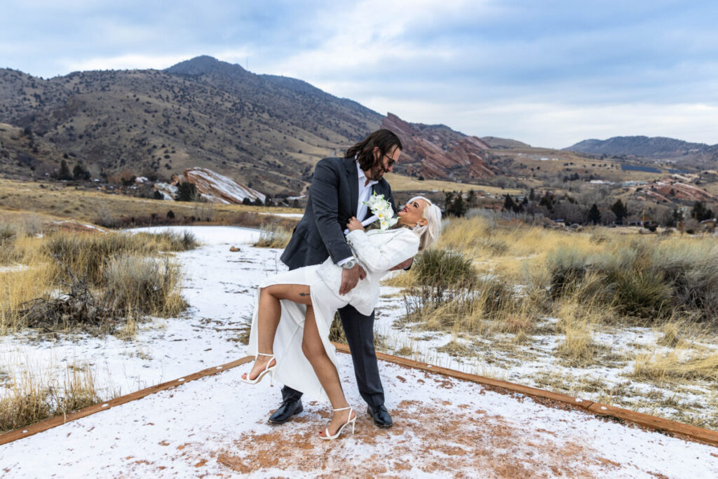 bride and groom at Red Rocks in Colorado