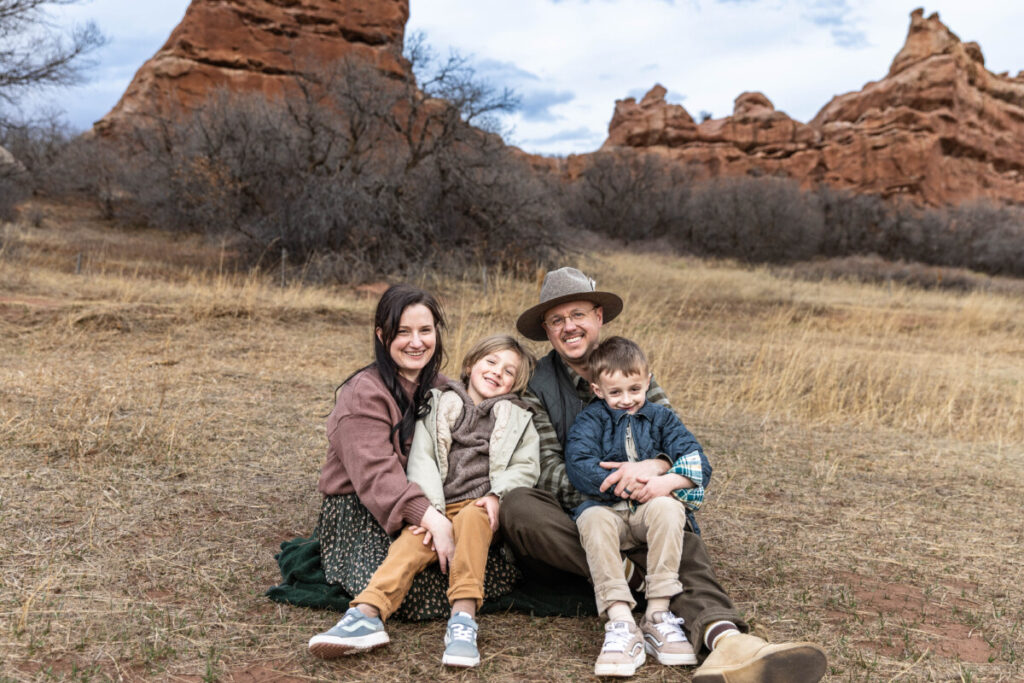 Family memories captured by Littleton photographer with red rocks at South Valley