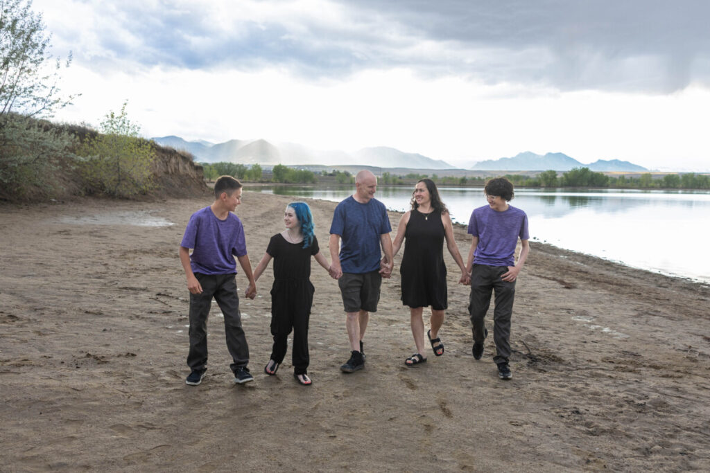 Colorado family at Standley Lake for a photo session at sunset on the beach
