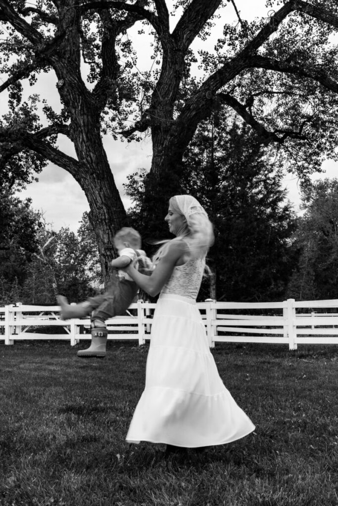 Littleton family photographer action shot of mother and son