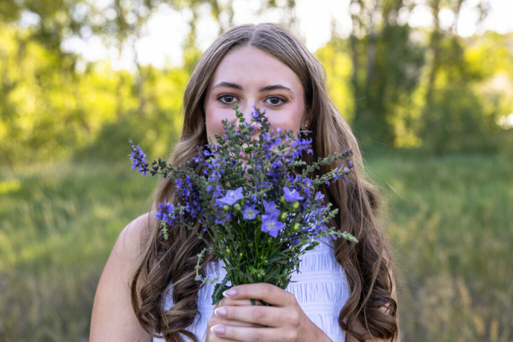 Flowers and teen girl in Colorado for senior photos
