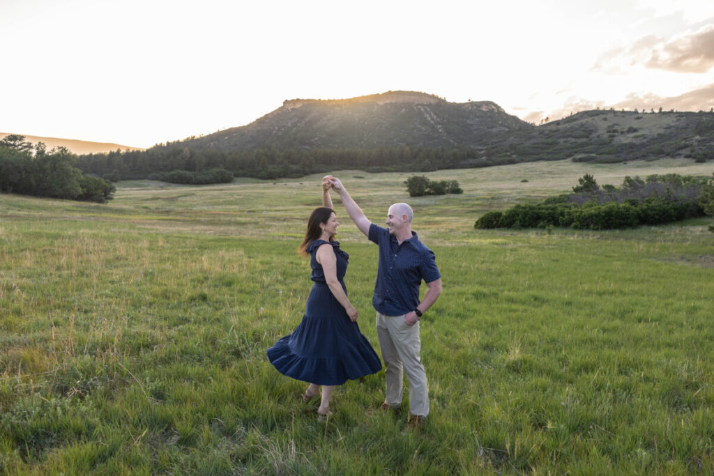 Colorado couple photographer at sunset with husband and wife