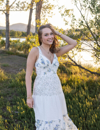 Colorado senior photographer in the foothills at sunset