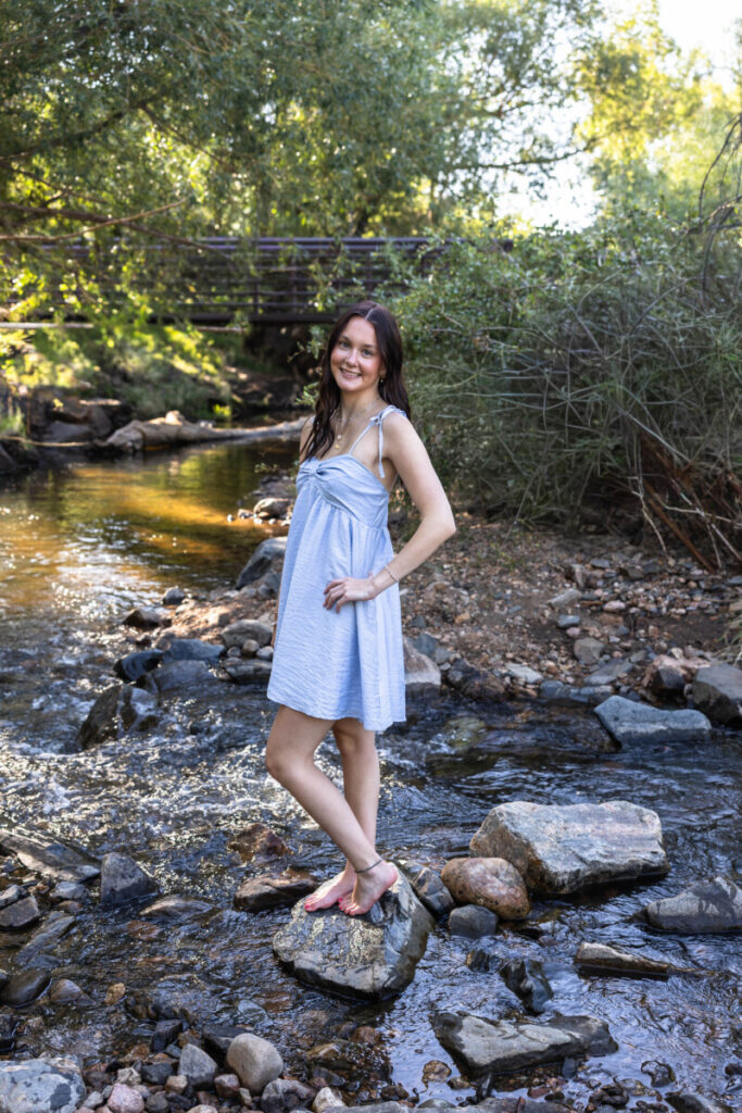 Senior photographer teen session in the river water