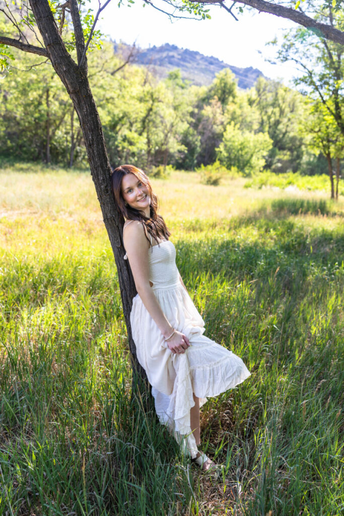 Colorado high school senior photographer at Lair O' the Bear with the foothills