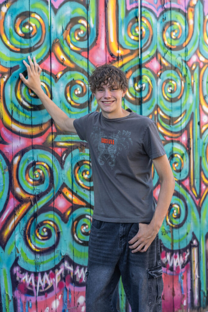 Urban senior photographer with teen