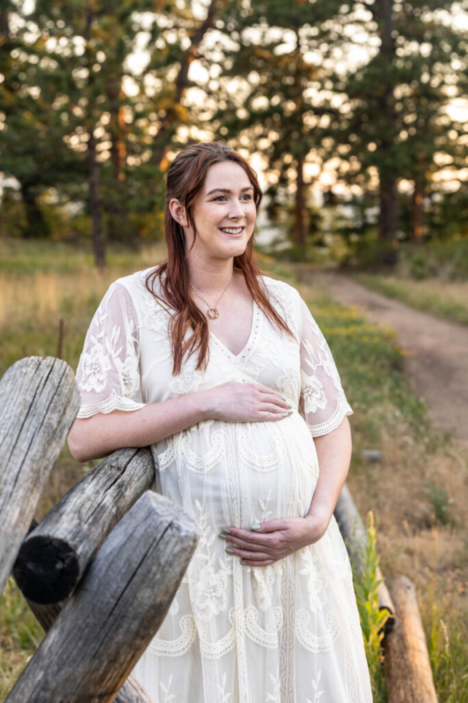 Colorado maternity photographer at sunset with baby bump