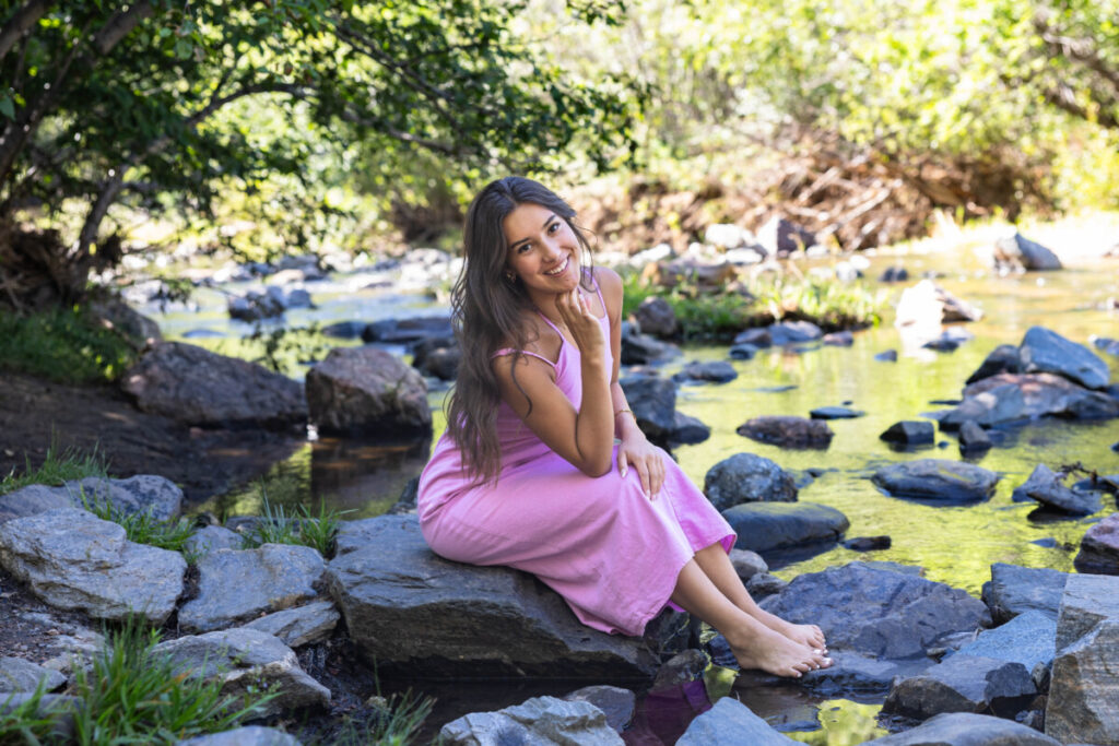 High school senior photography session at Lair O' the Bear in the river