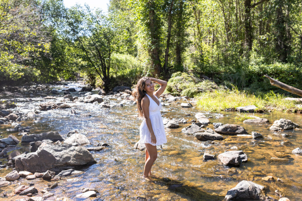 High school senior photography session in the river