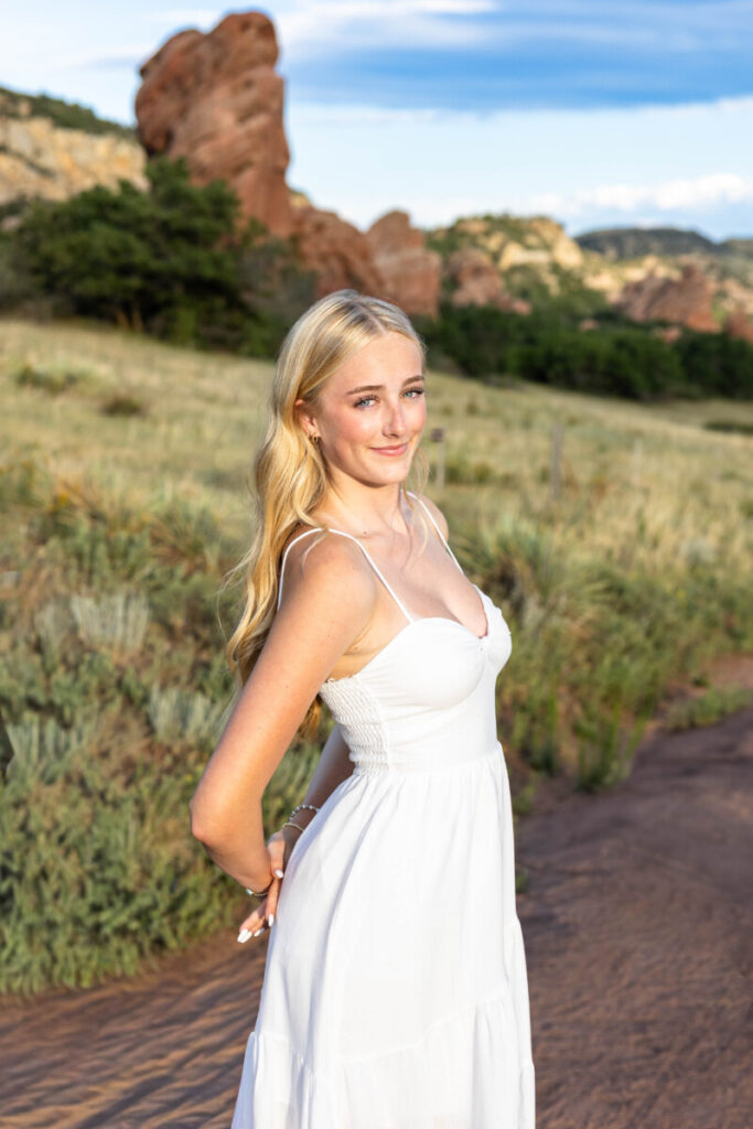 Colorado high school senior photographer with Red Rocks