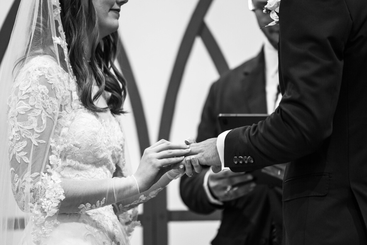 Wedding exchange of rings in Colorado church