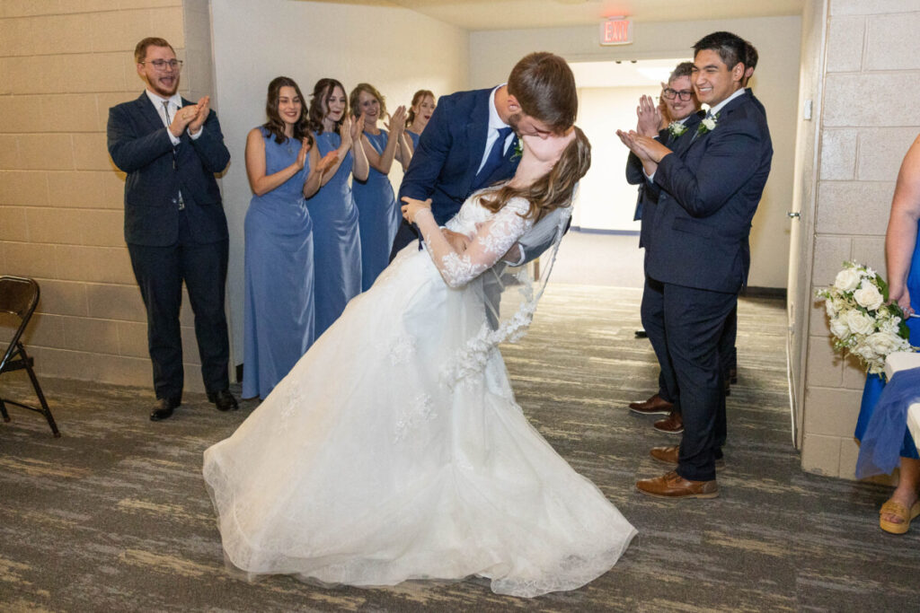 Wedding reception dip with bride and groom