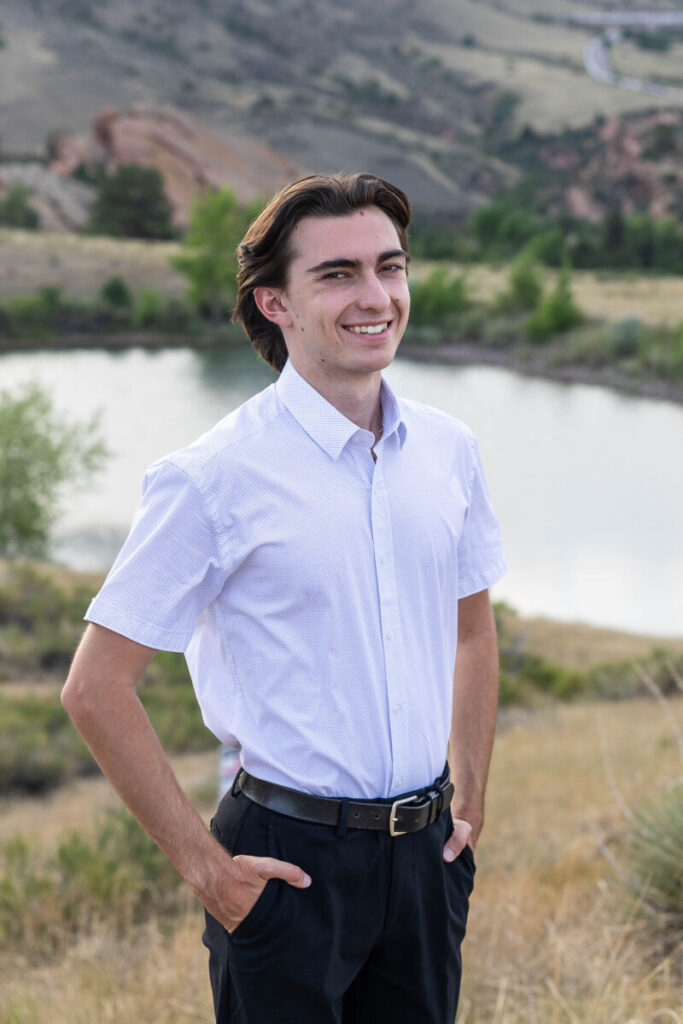 Colorado senior photo session with red rocks and water