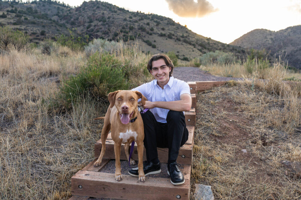 Teen boy with his dog for senior photos