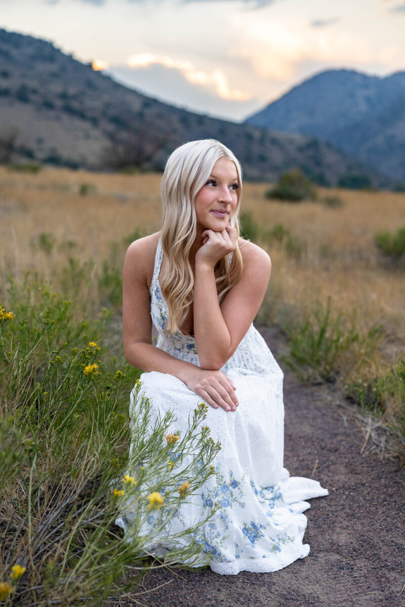 Littleton high school senior photographer in Colorado at red rocks at sunset