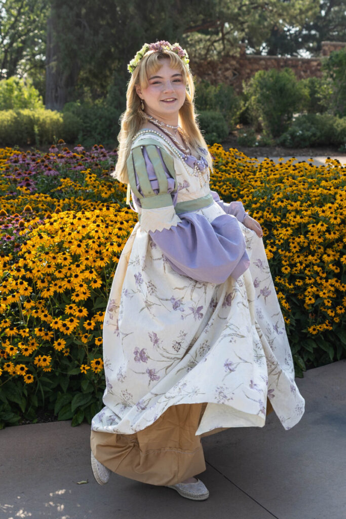 Littleton senior photographer in Colorado with flowers and teen girl