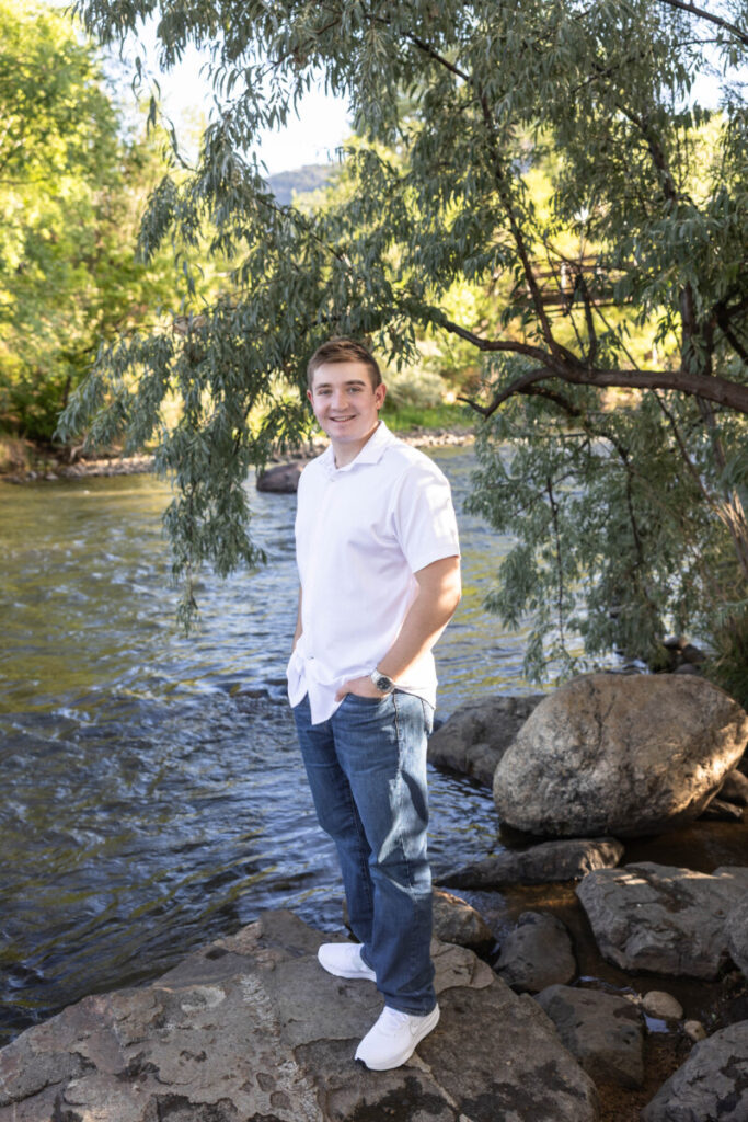 Colorado high school senior photographer near river in Golden