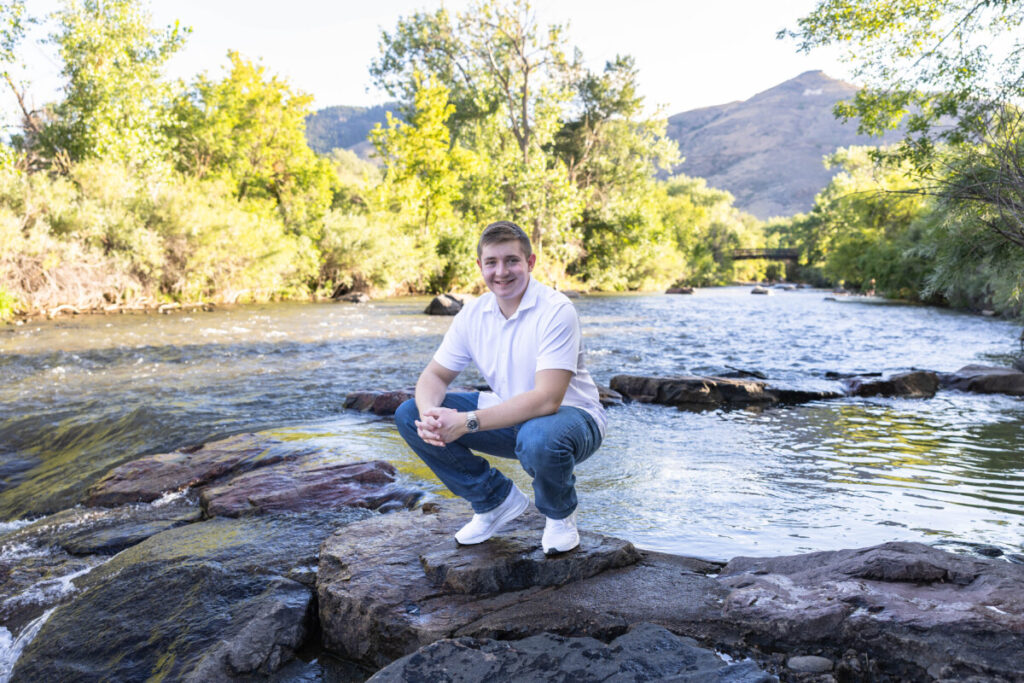 Colorado high school senior photography session on the river with the foothills