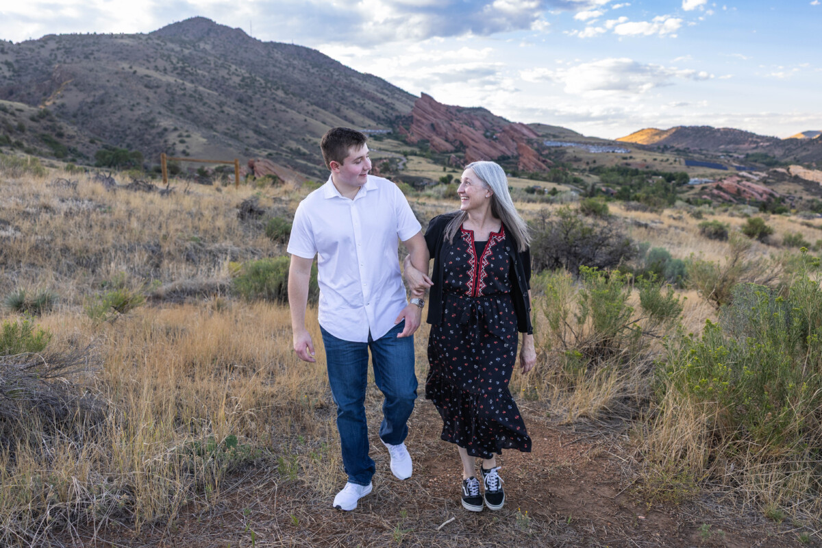 Colorado family and senior photographer with red rocks and foothills