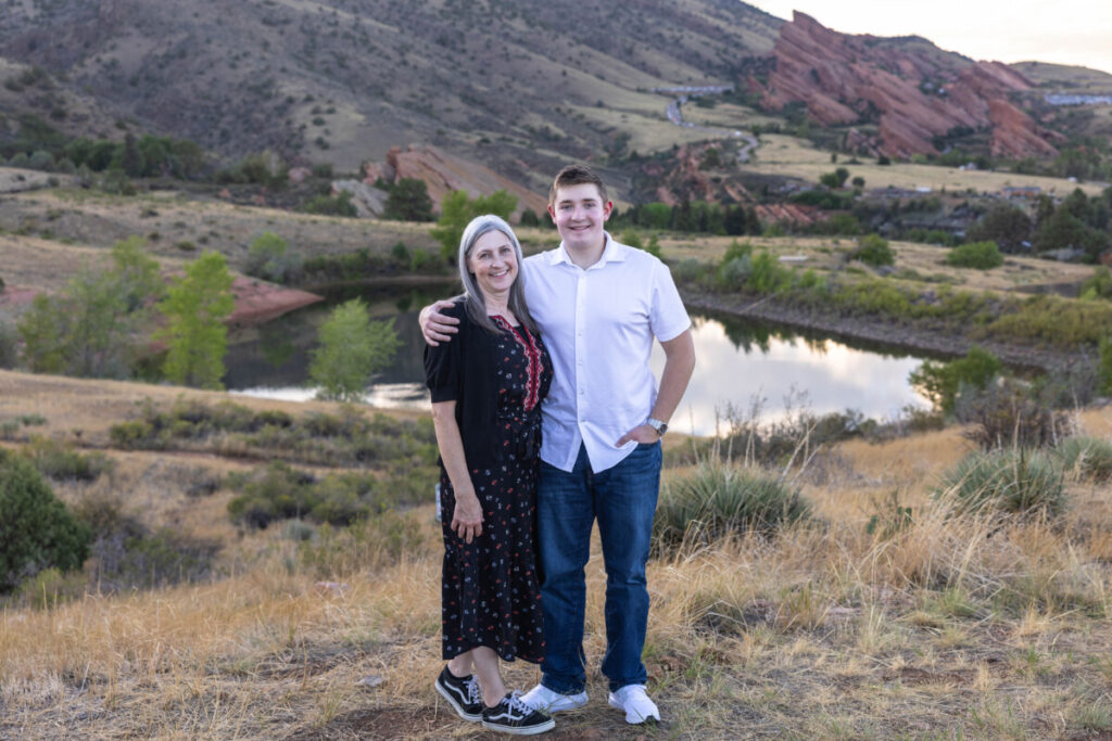 Colorado family and senior photography session at sunset with red rocks