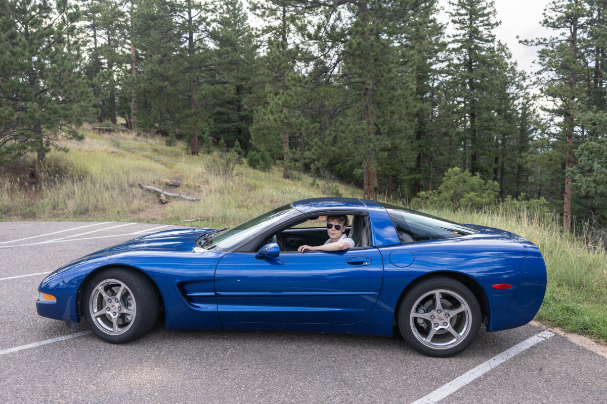 Colorado high school senior photographer with sports car