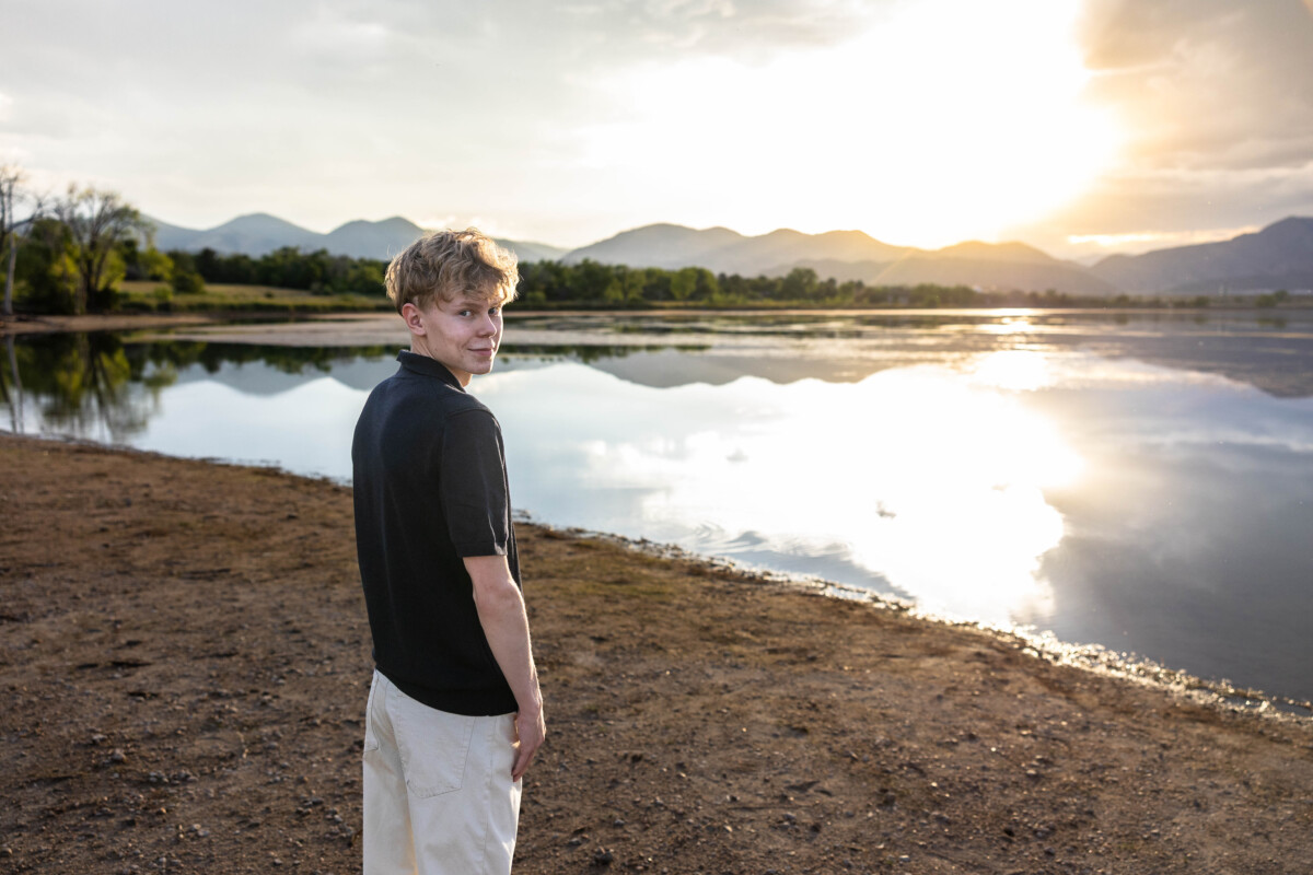Colorado high school senior photography session at sunset with foothills