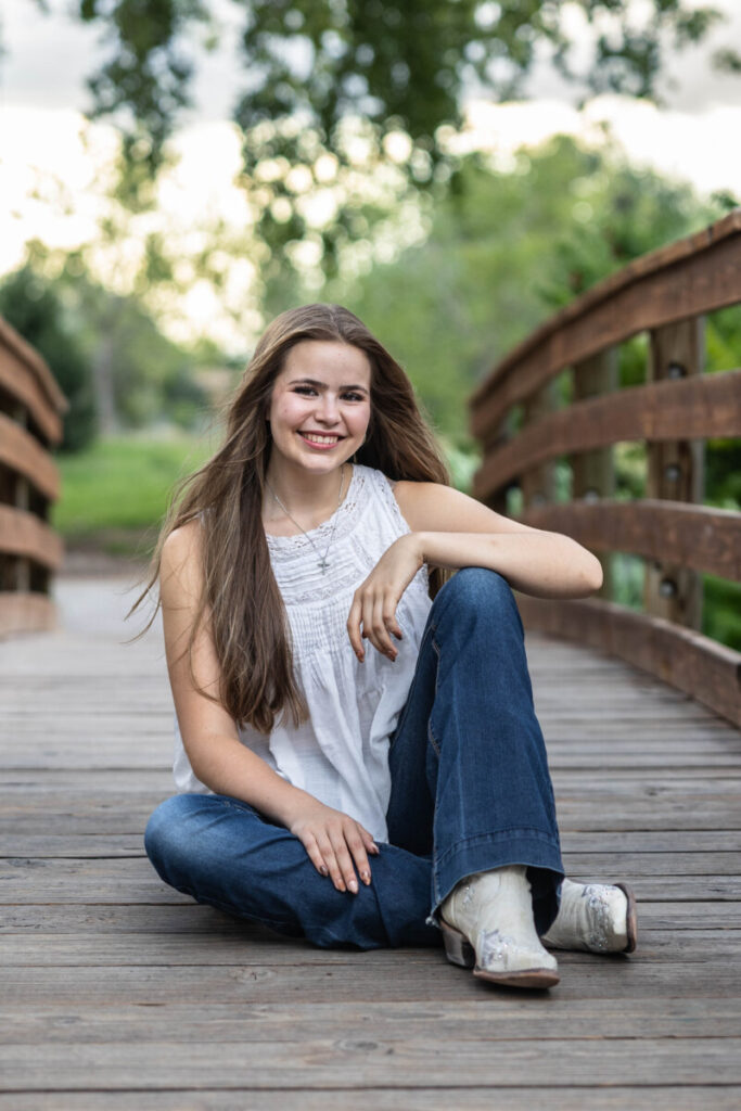Colorado high school senior photography session on a bridge
