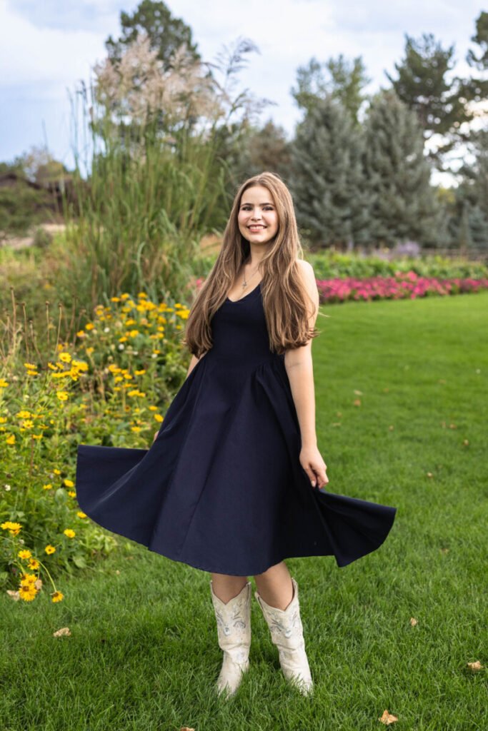 Colorado high school senior photography session with flowers at sunset