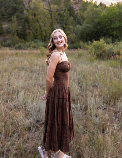 Littleton high school senior photography session at Lair O' the Bear at sunset