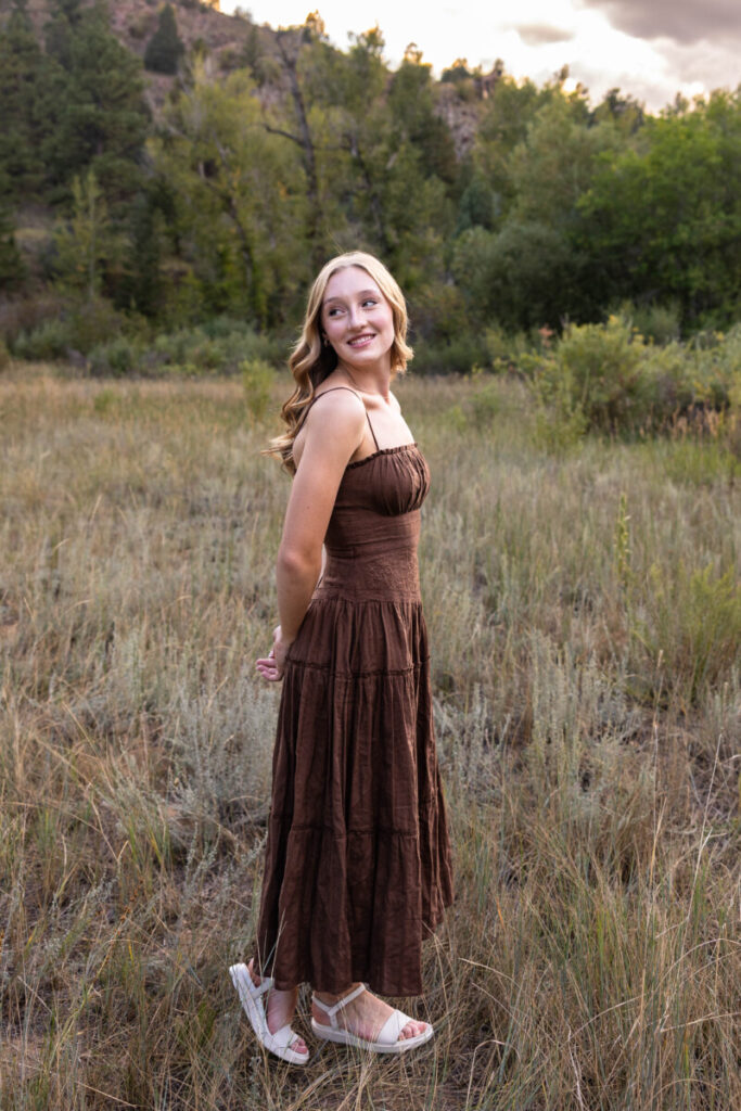 Littleton high school senior photography session at Lair O' the Bear at sunset