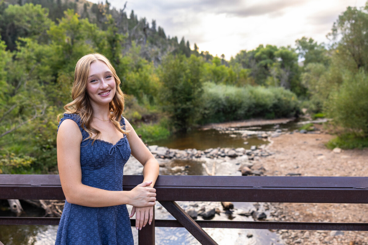 Colorado high school senior photography session at sunset along the river