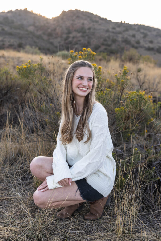Colorado family photographer teen girl in the foothills at sunset