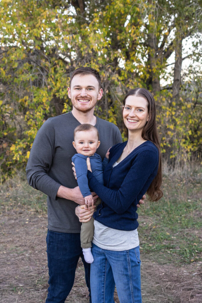 Colorado family photographer with a baby and parents