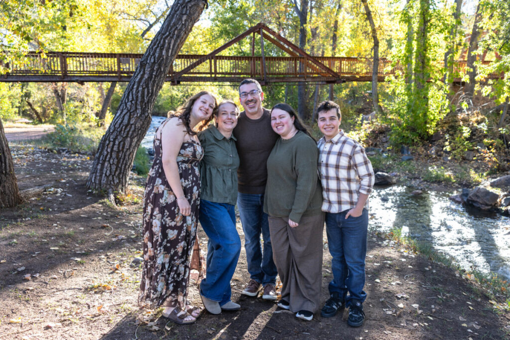 Colorado family photographer in Morrison with kids and fall leaves