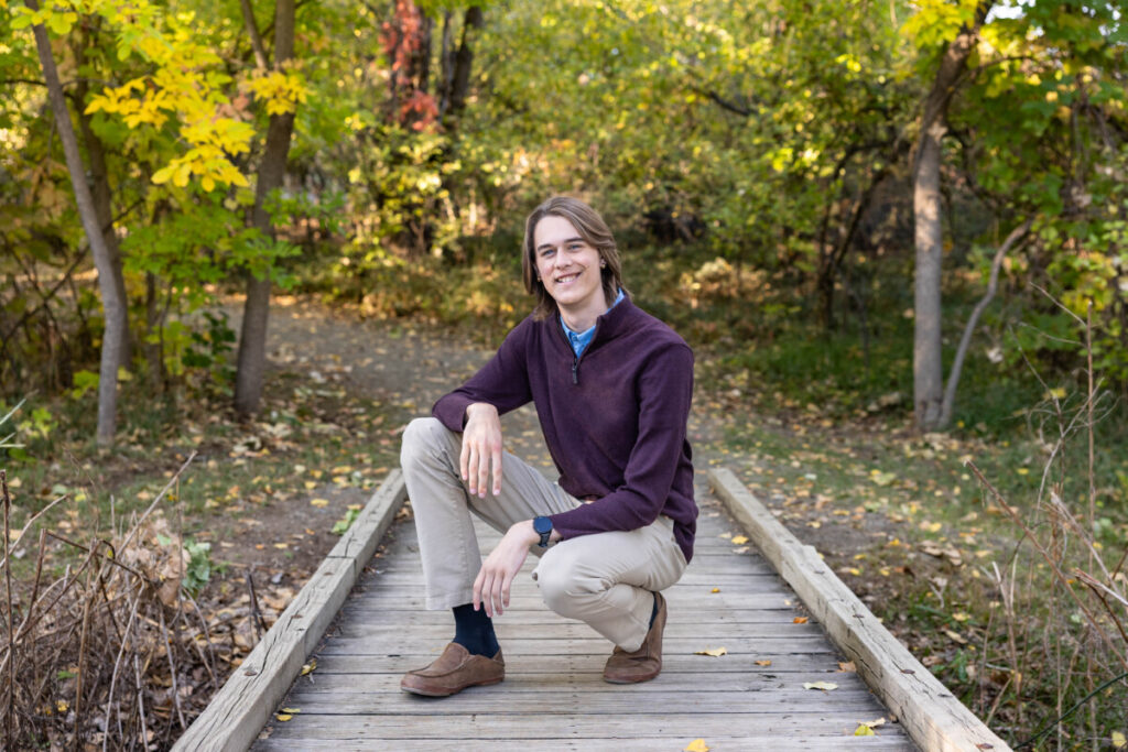 Littleton high school senior photographer in the fall leaves in Colorado