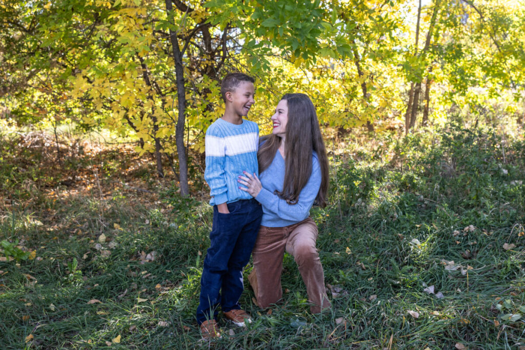 Colorado family photography session with mother and son in the fall leaves