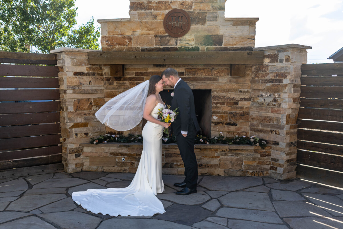 Colorado wedding photographer bride and groom with veil